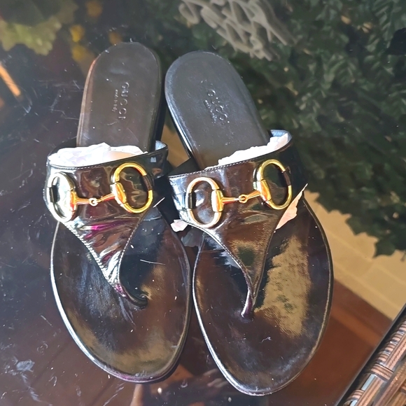 Gucci Shoes - Gucci black pattern leather  sandals worn and good condition.  Sz 8 B